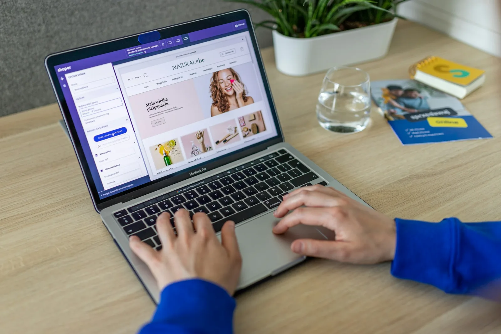 A merchant reviewing their online store's checkout and dashboard on a laptop during an ecommerce audit