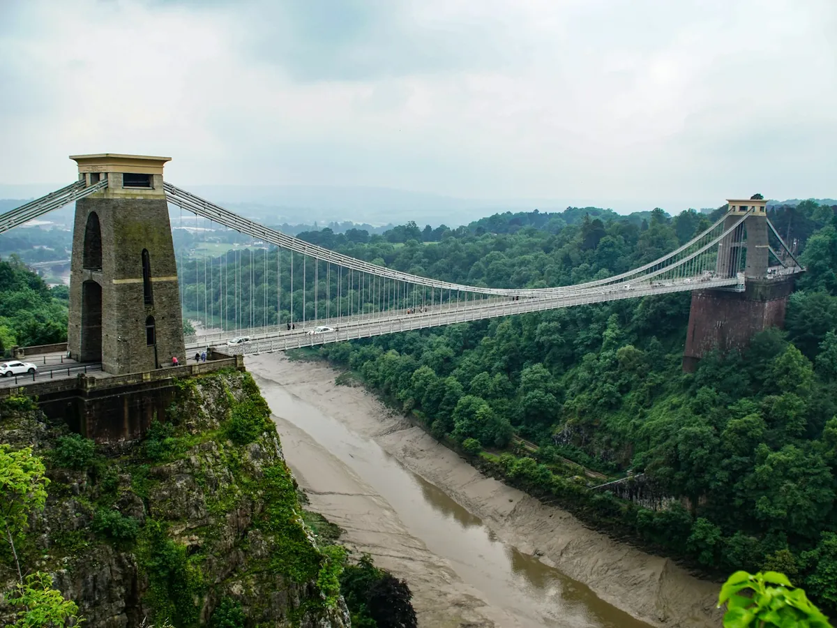The Clifton Suspension Bridge spanning the Avon Gorge at low tide
